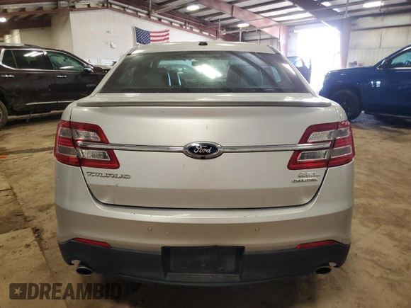 2013 Ford Taurus SEL z VIN 1FAHP2E82DG174647, wystawiony jako Copart lot #53784995 z przebiegiem Nie podano mil oraz Szkoda całkowita • Salvage title. Historia ofert i sprzedaży dostępna na DreamBid. Obrazek 6.