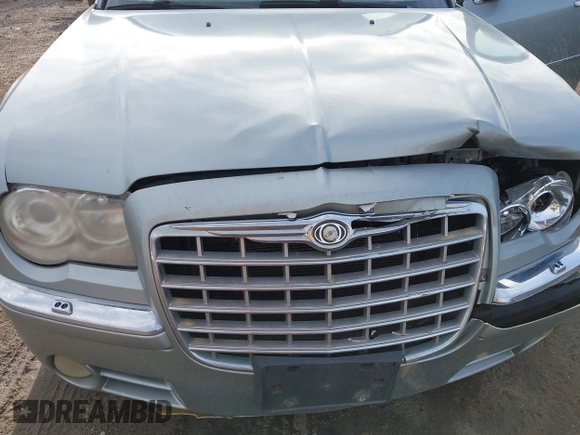 2006 Chrysler 300 C with VIN 2C3LK63H56H423161, listed as a IAAI auction lot 41947286 with 227,092 mi miles and . Bid and sale history available at carsss.com. Image 6.
