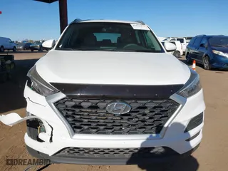2019 Hyundai Tucson Value with VIN KM8J33A49KU979927, listed as a IAAI auction lot 41818355 with 96,208 mi miles. Bid and sale history available at carsss.com. Image 12.