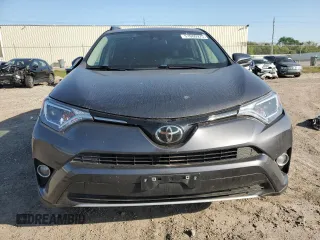 2018 Toyota RAV4 XLE with VIN 2T3WFREV0JW517488, listed as a Copart auction lot 51000975 with 68,105 mi miles and Salvage title. Bid and sale history available at DreamBid. Image 5.
