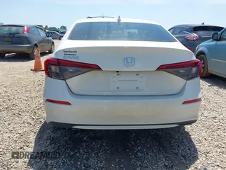 2023 Honda Civic EX with VIN 2HGFE1F76PH324177, listed as a IAAI auction lot 42253724 with 26,950 mi miles and . Bid and sale history available at DreamBid. Image 17.