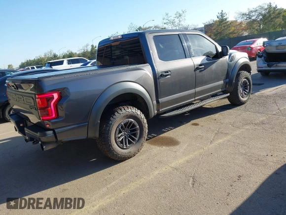 2020 Ford F-150 Raptor with VIN 1FTFW1RG5LFA62445, listed as a IAAI auction lot 41811982 with 95,947 mi miles and . Bid and sale history available at carsss.com. Image 4.
