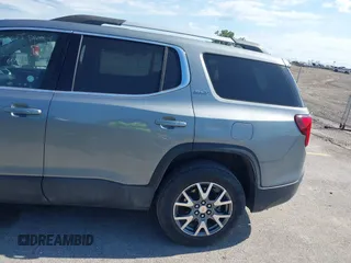 2023 GMC Acadia SLT with VIN 1GKKNML46PZ130813, listed as a IAAI auction lot 42614040 with 56,086 mi miles and . Bid and sale history available at DreamBid. Image 21.