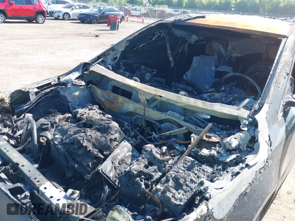 2013 Buick LaCrosse Leather z VIN 1G4GC5E31DF323770, wystawiony jako IAAI lot #42247069 z przebiegiem Nie podano mil oraz . Historia ofert i sprzedaży dostępna na DreamBid. Obrazek 6.