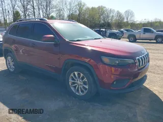 2019 Jeep Cherokee Latitude with VIN 1C4PJLCB2KD285788, listed as a IAAI auction lot 41985636 with 117,747 mi miles. Bid and sale history available at carsss.com. Image 1.