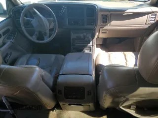2006 GMC Yukon Denali z VIN 1GKEK63UX6J136371, wystawiony jako Copart lot #50168595 z przebiegiem Nie podano mil oraz Szkody całkowita. Historia ofert i sprzedaży dostępna na DreamBid. Obrazek 8.