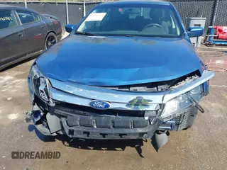 2010 Ford Fusion SE z VIN 3FAHP0HA0AR355625, wystawiony jako IAAI lot #41938652 z przebiegiem 157 660 mil mil oraz . Historia ofert i sprzedaży dostępna na DreamBid. Obrazek 6.