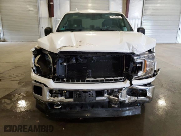 2018 Ford F-150 XL with VIN 1FTEW1EPXJFA44652, listed as a Copart auction lot 58329735 with 98,054 mi miles and Salvage title. Bid and sale history available at DreamBid. Image 5.