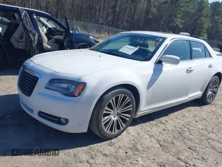 2013 Chrysler 300 with VIN 2C3CCABGXDH699096, listed as a IAAI auction lot 41614034 with 136,344 mi miles. Bid and sale history available at carsss.com. Image 20.