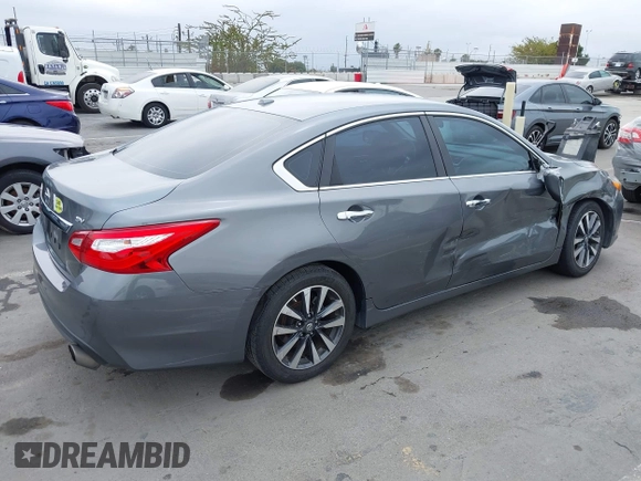 2016 Nissan Altima S z VIN 1N4AL3AP5GC131352, wystawiony jako IAAI lot #42418679 z przebiegiem 106 576 mil mil oraz . Historia ofert i sprzedaży dostępna na DreamBid. Obrazek 4.