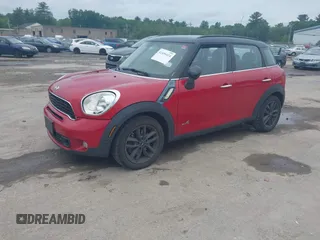 2014 MINI Countryman S z VIN WMWZC5C50EWP39566, wystawiony jako IAAI lot #42456424 z przebiegiem 99 518 mil mil oraz . Historia ofert i sprzedaży dostępna na DreamBid. Obrazek 2.