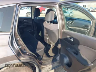 2013 Honda CR-V LX with VIN 3CZRM3H31DG703436, listed as a IAAI auction lot 42702584 with 140,013 mi miles and . Bid and sale history available at DreamBid. Image 8.