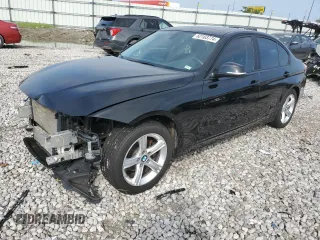 2014 BMW 3 Series 328i xDrive with VIN WBA3B3C59EJ978799, listed as a Copart auction lot 62163774 with 98,608 mi miles and Salvage Title. Bid and sale history available at carsss.com. Image 1.
