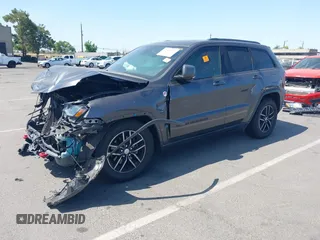 2017 Jeep Grand Cherokee Trailhawk with VIN 1C4RJFLG7HC654259, listed as a IAAI auction lot 42510197 with 103,947 mi miles and . Bid and sale history available at DreamBid. Image 2.