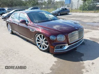2021 Bentley Flying Spur W12 with VIN SCBBB6ZG9MC084879, listed as a IAAI auction lot 41264979 with Not Provided miles and . Bid and sale history available at DreamBid. Image 1.