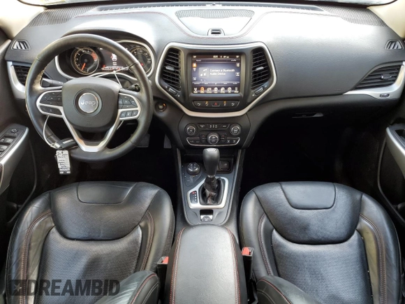 2017 Jeep Cherokee Trailhawk L Plus с VIN 1C4PJMBS0HD214427, выставлен на аукционе Copart как лот 57035035 с пробегом 123 957 миль миль и Списание • Salvage title. История ставок и продаж доступна на DreamBid. Изображение 8.