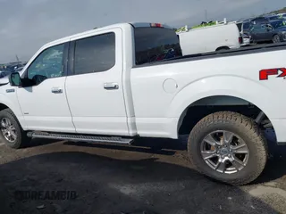 2016 Ford F-150 XLT with VIN 1FTFW1EG9GFC01505, listed as a IAAI auction lot 41534892 with 156,150 mi miles. Bid and sale history available at carsss.com. Image 15.