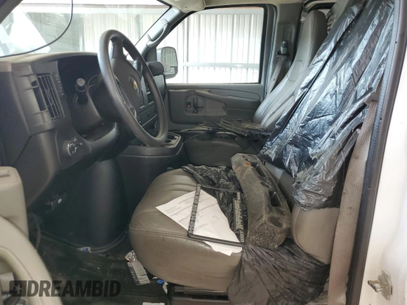 2014 Chevrolet Express Cargo with VIN 1GCZGTCG8E1213177, listed as a Copart auction lot 73557024 with Not provided miles and Salvage title. Bid and sale history available at DreamBid. Image 7.