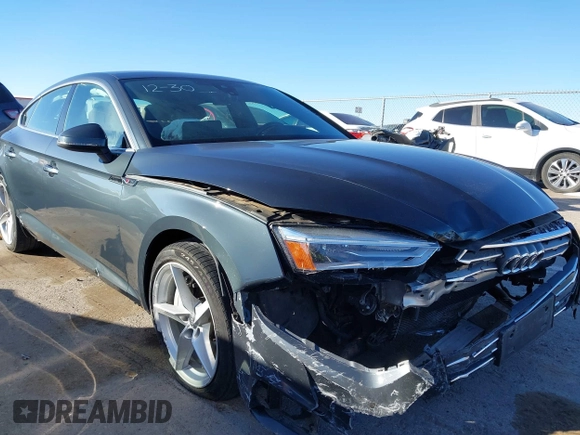 2018 Audi A5 Sportback Premium z VIN WAUDNCF52JA044291, wystawiony jako IAAI lot #41219360 z przebiegiem 86 273 mil mil oraz . Historia ofert i sprzedaży dostępna na DreamBid. Obrazek 6.