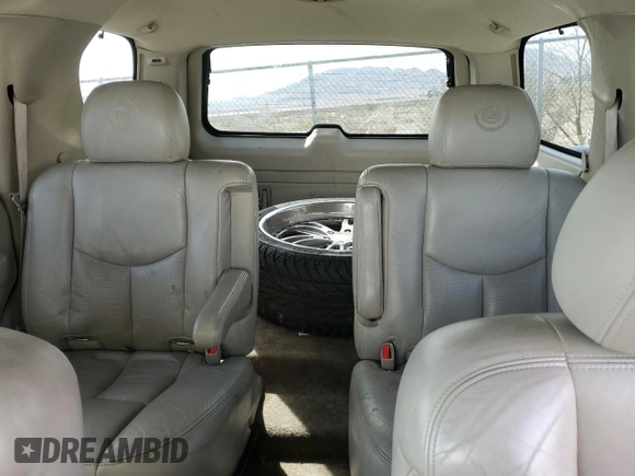 2004 Cadillac Escalade z VIN 1GYEC63T44R185526, wystawiony jako Copart lot #50969335 z przebiegiem 129 386 mil mil oraz Szkoda całkowita • Salvage title. Historia ofert i sprzedaży dostępna na DreamBid. Obrazek 10.