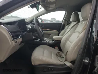 2023 Cadillac XT4 FWD Luxury with VIN 1GYAZAR45PF218684, listed as a Copart auction lot 54427565 with 74,920 mi miles and Salvage Title. Bid and sale history available at carsss.com. Image 7.