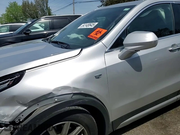 2019 Cadillac XT4 AWD Premium Luxury with VIN 1GYFZDR48KF194395, listed as a Copart auction lot 54148645 with 52,561 mi miles and Salvage Title. Bid and sale history available at carsss.com. Image 14.