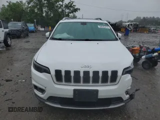 2019 Jeep Cherokee Limited z VIN 1C4PJMDXXKD409564, wystawiony jako Copart lot #60893225 z przebiegiem 128 674 mil mil oraz Szkoda całkowita • Salvage title. Historia ofert i sprzedaży dostępna na DreamBid. Obrazek 5.
