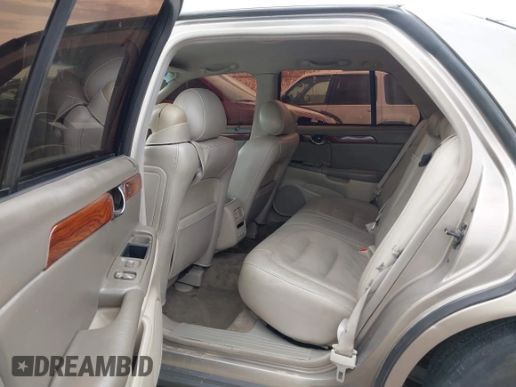 2003 Cadillac DeVille z VIN 1G6KD54Y63U223640, wystawiony jako IAAI lot #41704549 z przebiegiem 127 981 mil mil oraz . Historia ofert i sprzedaży dostępna na DreamBid. Obrazek 8.