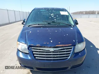 2006 Chrysler Town & Country with VIN 1A4GP45R36B533363, listed as a IAAI auction lot 41758823 with 265,663 mi miles and . Bid and sale history available at DreamBid. Image 6.
