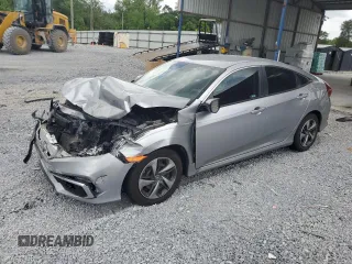 2021 Honda Civic LX z VIN 2HGFC2F62MH507154, wystawiony jako Copart lot #55692815 z przebiegiem 47 156 mil mil oraz Szkoda całkowita • Salvage title. Historia ofert i sprzedaży dostępna na DreamBid. Obrazek 1.