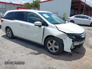 2018 Honda Odyssey EX-L z VIN 5FNRL6H76JB111027, wystawiony jako IAAI lot #42234196 z przebiegiem 88 855 mil mil oraz . Historia ofert i sprzedaży dostępna na DreamBid. Obrazek 1.