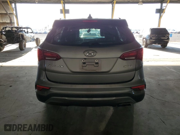 2018 Hyundai Santa Fe 2.4L с VIN 5NMZU3LB0JH055625, выставлен на аукционе Copart как лот 63696515 с пробегом 92 326 миль миль и Списание • Salvage title. История ставок и продаж доступна на DreamBid. Изображение 6.