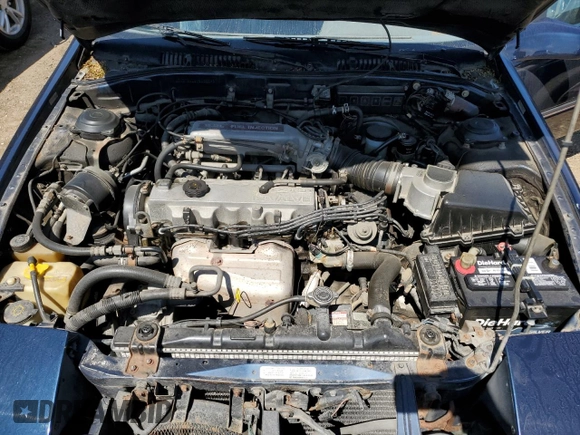 1989 Ford Probe z VIN 1ZVBT21C9K5202343, wystawiony jako Copart lot #55885985 z przebiegiem 150 457 mil mil oraz Czysty tytuł • Clean title. Historia ofert i sprzedaży dostępna na DreamBid. Obrazek 11.