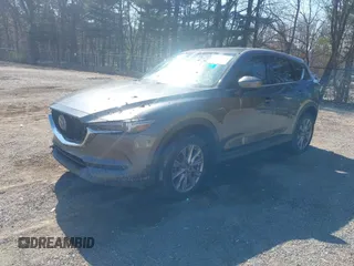 2020 Mazda CX-5 Grand Touring with VIN JM3KFBDM1L0821975, listed as a IAAI auction lot 40088794 with 68,895 mi miles and . Bid and sale history available at DreamBid. Image 23.