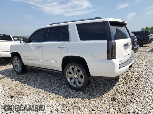 2016 GMC Yukon Denali with VIN 1GKS1CKJ3GR403865, listed as a Copart auction lot 68534264 with 129,655 mi miles and Salvage Title. Bid and sale history available at carsss.com. Image 2.