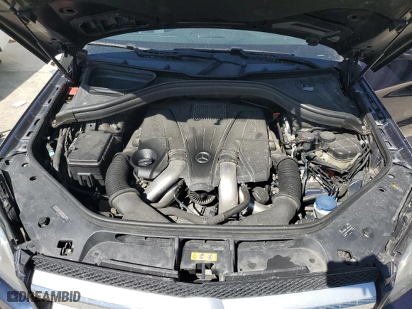 2015 Mercedes-Benz GL-Class GL 550 with VIN 4JGDF7DE5FA588474, listed as a Copart auction lot 69263034 with 143,093 mi miles and Clean Title. Bid and sale history available at carsss.com. Image 12.