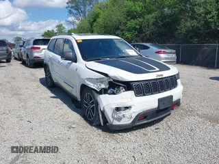 2021 Jeep Grand Cherokee Trailhawk with VIN 1C4RJFLG7MC666230, listed as a IAAI auction lot 42634337 with 99,321 mi miles and . Bid and sale history available at DreamBid. Image 1.