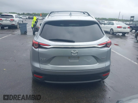 2020 Mazda CX-9 Touring with VIN JM3TCBCY8L0400787, listed as a IAAI auction lot 42188981 with 86,459 mi miles and . Bid and sale history available at DreamBid. Image 16.