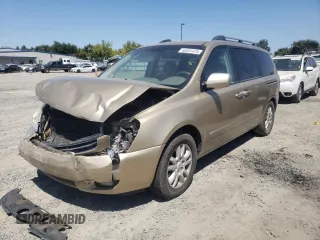 2006 Kia Sedona LX with VIN KNDMB233666035774, listed as a Copart auction lot 65491474 with 106,909 mi miles and Salvage Title. Bid and sale history available at carsss.com. Image 1.