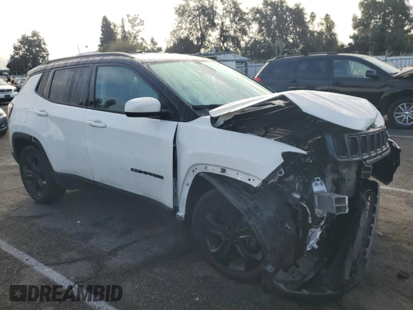 2020 Jeep Compass Altitude with VIN 3C4NJCBBXLT246631, listed as a Copart auction lot 82489344 with 30,116 mi miles and Salvage Title. Bid and sale history available at carsss.com. Image 4.