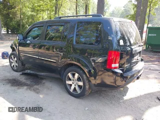 2013 Honda Pilot Touring with VIN 5FNYF3H96DB011470, listed as a IAAI auction lot 42535022 with 201,380 mi miles and . Bid and sale history available at DreamBid. Image 3.