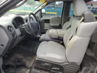 2007 Ford F-150 XL with VIN 1FTRF12297KD65656, listed as a Copart auction lot 59764355 with 97,702 mi miles and Salvage title. Bid and sale history available at DreamBid. Image 7.
