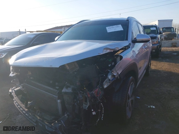 2018 Hyundai Tucson Value with VIN KM8J3CA23JU651464, listed as a IAAI auction lot 41757165 with 72,339 mi miles. Bid and sale history available at carsss.com. Image 2.