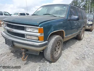 1995 Chevrolet Tahoe with VIN 1GNEK13K3SJ412971, listed as a IAAI auction lot 41940461 with 425,128 mi miles. Bid and sale history available at carsss.com. Image 2.