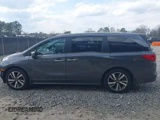 2023 Honda Odyssey Touring with VIN 5FNRL6H86PB065670, listed as a IAAI auction lot 41691093 with 22,518 mi miles and . Bid and sale history available at DreamBid. Image 15.