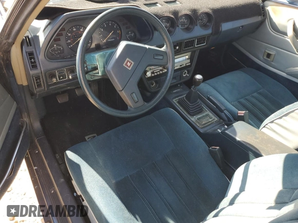 1979 Datsun 280ZX z VIN HS130133365, wystawiony jako Copart lot #77113584 z przebiegiem 99 721 mil mil oraz Szkoda całkowita • Salvage title. Historia ofert i sprzedaży dostępna na DreamBid. Obrazek 8.
