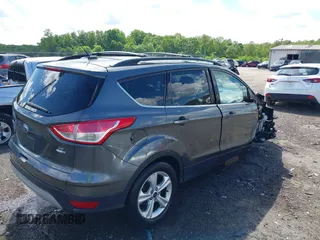 2016 Ford Escape SE z VIN 1FMCU9GX8GUA79697, wystawiony jako IAAI lot #42199779 z przebiegiem 131 826 mil mil oraz . Historia ofert i sprzedaży dostępna na DreamBid. Obrazek 4.