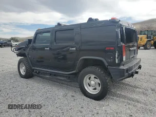 2004 Hummer H2 z VIN 5GRGN23U74H100175, wystawiony jako Copart lot #52642125 z przebiegiem 112 305 mil mil oraz Szkoda całkowita • Salvage title. Historia ofert i sprzedaży dostępna na DreamBid. Obrazek 2.
