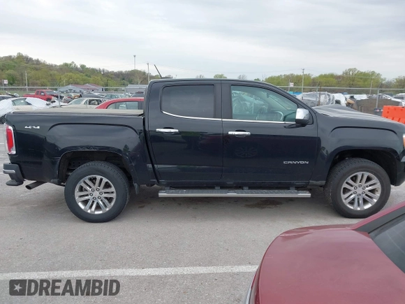 2016 GMC Canyon 4WD SLT z VIN 1GTG6DE36G1374639, wystawiony jako IAAI lot #42024354 z przebiegiem 61 752 mil mil oraz . Historia ofert i sprzedaży dostępna na DreamBid. Obrazek 13.