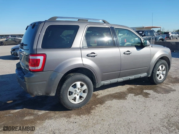 2009 Ford Escape Limited with VIN 1FMCU94G19KC45724, listed as a IAAI auction lot 41860671 with 188,520 mi miles. Bid and sale history available at carsss.com. Image 4.
